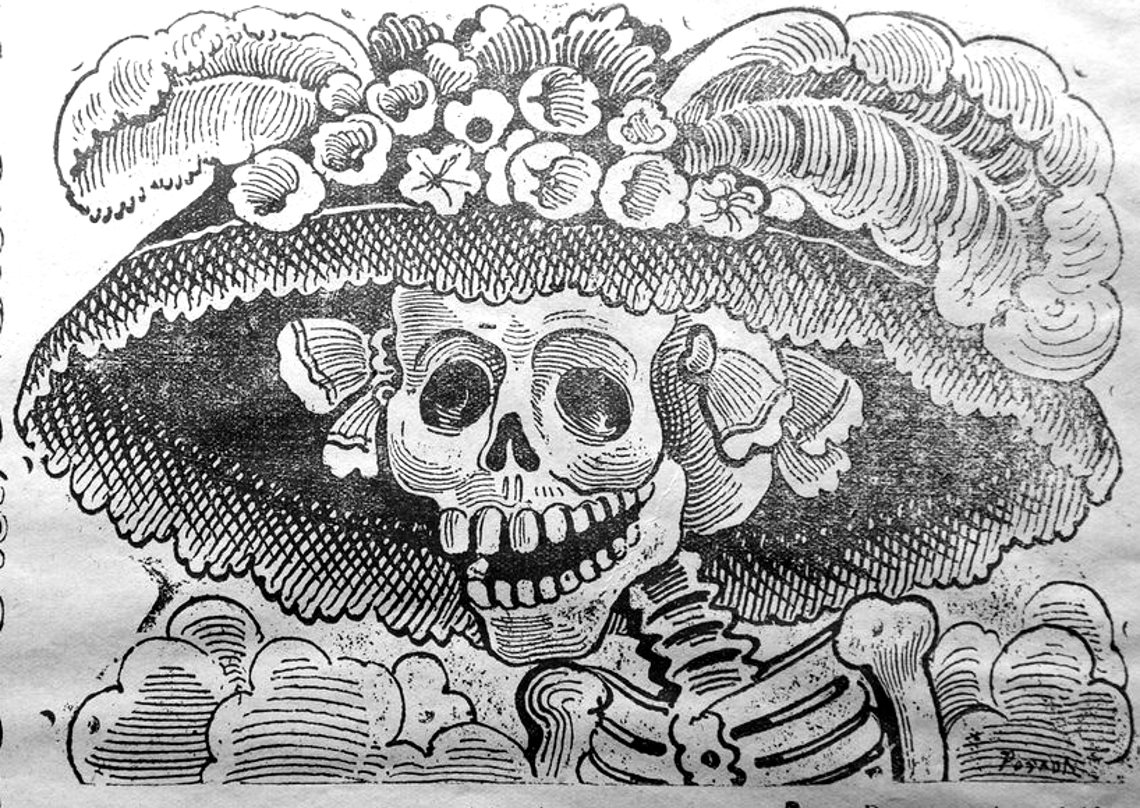Close view of La Calavera Catrina: a grinning skull under a very wide hat trimmed with flowers and feathers, with the signature Posada at lower right