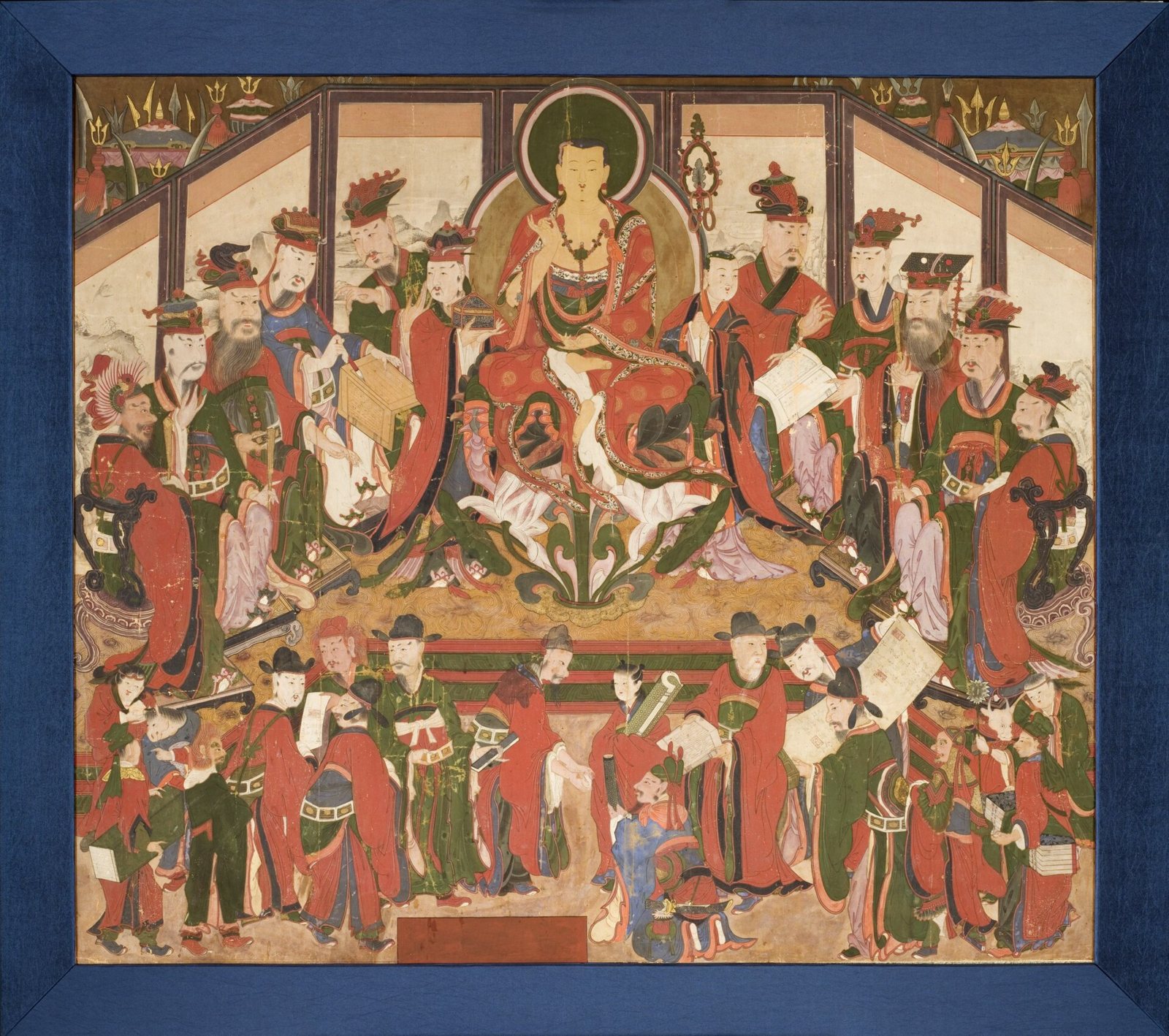 Pintura coreana del bodhisattva Jijang sentado en el centro, con los Diez Reyes y sus asistentes con túnicas rojas y verdes y sombreros negros a ambos lados y debajo