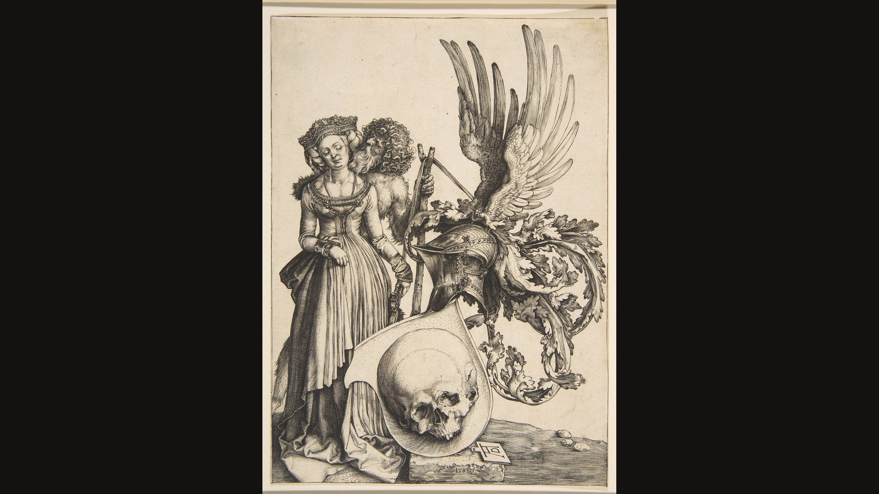Albrecht Dürer's engraving of a shield bearing a large skull, with a winged helmet crest above and a wild man embracing a young woman beside it