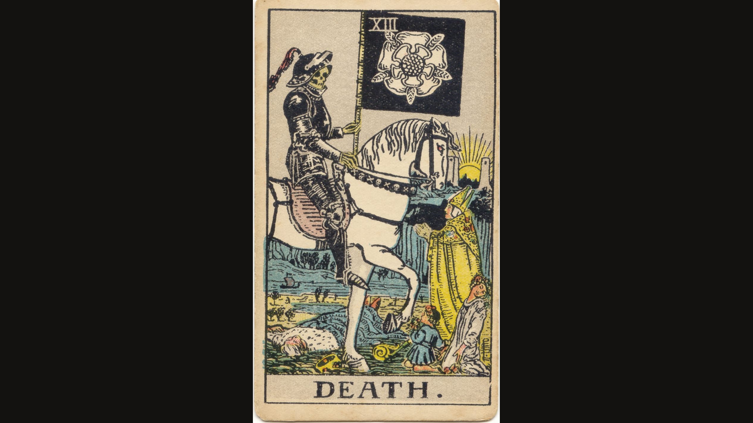 The Death card from the 1909 Waite-Smith tarot deck: a skeleton in black armor on a white horse carrying a black banner with a white rose, with a fallen king, a bishop, a young woman and a child before him and a sun rising between two towers behind